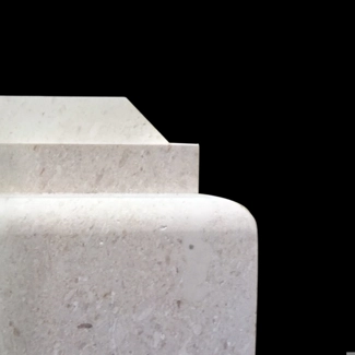 Plano marble profile cladding of a column base